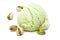 A scoop of pistachio ice cream with pistachios isolated on white background