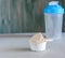 Scoop of protein and shaker. Sports nutrition