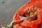 Scooper Full Of Peanuts Sits In Bag At Farmers Market