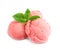 Scoops of delicious strawberry ice cream with mint on white