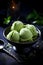 Scoops of matcha ice cream in a bowl on a black background