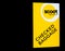 Scoot airlines yellow sticker `checked baggage` attached to black luggage.