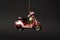 Scooter Christmas tree toy on dark background with copy space