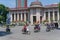 Scooter traffic in front of State Bank of Vietnam in Hanoi