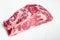 Scotch Fillet whole cut, marbled beef rib eye top choice meat, on white stone  background