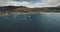 Scotland`s sailboats ocean seascape aerial view in coastal water of Brodick Bay. Ships and boats