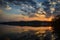 Scotland Sunrise Lake with clouds reflection