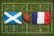 Scotland vs. France flags on rugby field