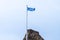 Scotlands Saltire Flag Flying High on Top of One of Scotlands Historic Castles in Seamill Scotland