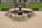 Scotney Castle fountain in Lamberhurst, Kent, England, Europe