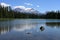 Scott Lake and Middle and North Sisters volcanoes, Oregon.