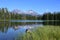 Scott Lake and Middle and North Sisters volcanoes, Oregon.