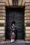 Scottish bagpiper in traditional clothing and Scottish kilt on the Royal Mile in Edinburgh