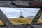 Scottish Cairn Through Wooden Gate