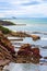 Scottish coastline with rocks and blue sea