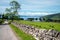 Scottish country road with stone wall,leading to Applecross village,Highlands of Scotland,UK