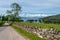 Scottish country road with stone wall,leading to Applecross village,Highlands of Scotland,UK