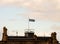 Scottish flag flying over a building