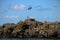 Scottish Flag and Rusting Anchor at a Scottish Harbour