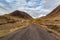 Scottish Highland Road Disappearing to Distance