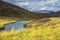 Scottish landscape in Cairngorm Mountains and Glen Clunie river. Royal Deeside, Braemar, Aberdeenshire, Scotland