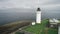 Scottish Lighthouse aerial view on seashore