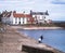 Scottish village, Fife, coast, North Sea, inlet with man and child fishing