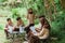 Scout teenage girls lead a briefing of friends while gathering