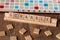 Scrabble board game with the scrabble tile spelling `Scrabble`