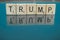 Scrabble Letter Tiles spelling President Trump