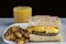 scramble egg top with cheese with sausage patty on ciabatta