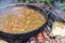 Scrambled eggs on a campfire camping in the nature Shakshouka national cuisine