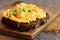 Scrambled eggs omelette idea. Home scrambled eggs omelette with vegetables on rye bread toasts. Healthy eating to lose weight. Rus