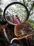 The scrap bicycle with tire lying on the garbage dump