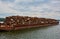 Scrap metal on a barge on a river in Germany