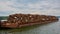 Scrap metal on a barge on a river in Germany