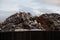 Scrap metal recycling compound viewed from boundary fence