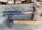 Scrap metal from various spare parts, rusty old antique iron hammers, scrap metal