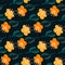 Scrapbook seamless botanic pattern with orange flowe silhouettes. Black background. Simple design