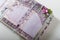 Scrapbooking wedding photoalbum spread with paper decorative elements, flowers, beads, tapes, ribbons, hearts and frames