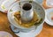 Scraps of food left in soup pot plastic dish on table