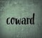 scratch and grunge background the word coward in black color