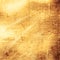 Scratched gold metal background