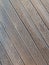 Scratched rustic wooden background. Wood texture. Close up of wall made of diagonal wood planks vintage