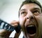 Scream of angry stressed man at phone