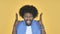 Screaming Angry Afro-American Man on Yellow Background