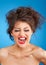 Screaming female with crazy hairstyle and red lips