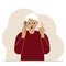 Screaming grandfather talking on a cell phone with emotions. One hand with the phone the other with a forefinger up