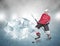 Screaming hockey player on abstract ice background