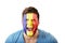 Screaming man with Andora flag on face.
